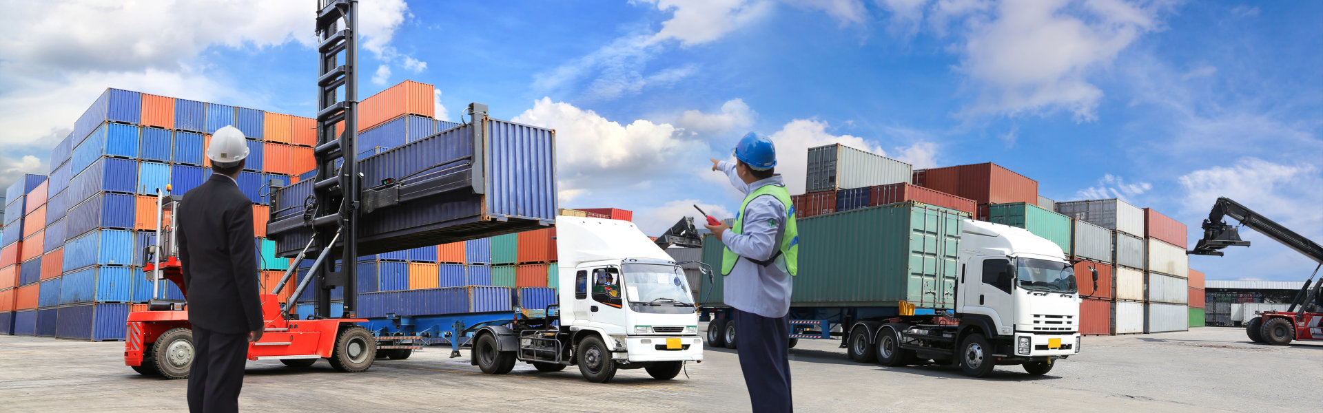 trucks in logistics facility and trucks surveyors